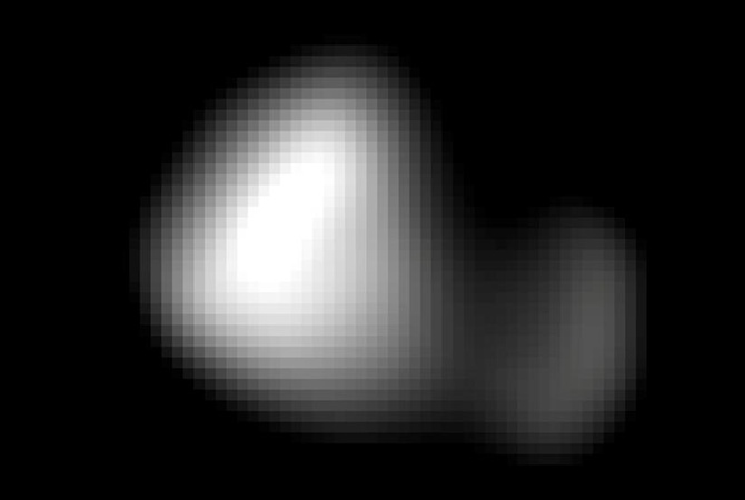 NASA впервые показали снимки самого маленького спутника Плутона – Кербера
    
  
       
      Кербер оказался маленьк